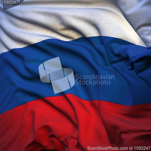 Image of Russian flag, fluttering in the breeze, backlit rising sun