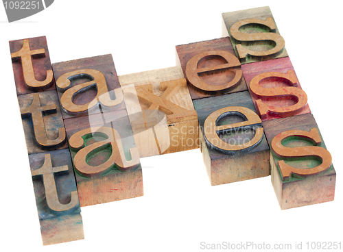 Image of taxes word abstract