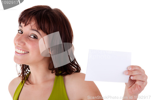 Image of beautiful woman with blank business card in hand