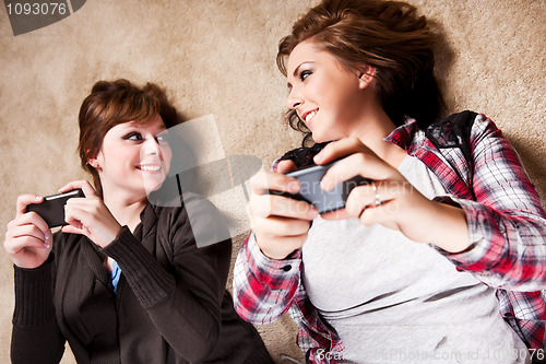 Image of Teenagers texting