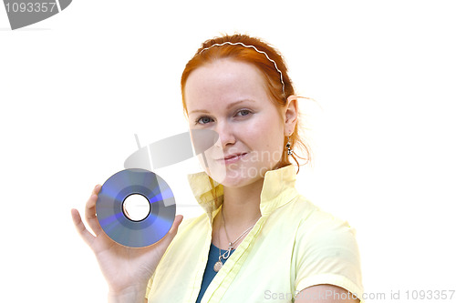 Image of redhead young woman holding a CD