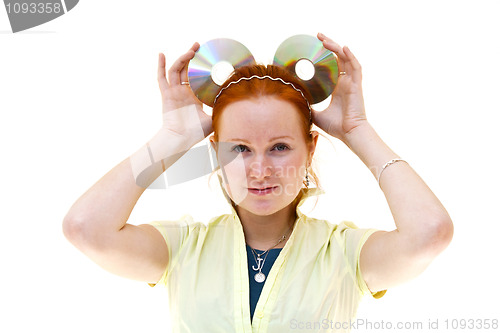 Image of redhead young woman holding a CDs