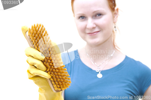 Image of redhead young woman as a housewhife