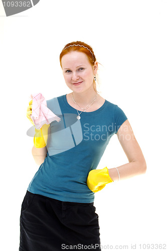Image of redhead young woman holding a rag