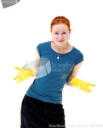 Image of redhead young woman with yellow gloves