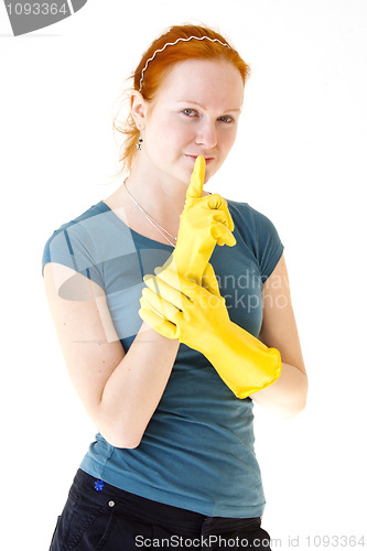 Image of redhead young woman with yellow gloves