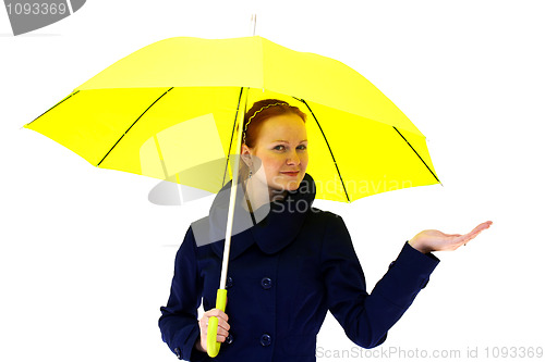 Image of redhead young woman holding an umbrella