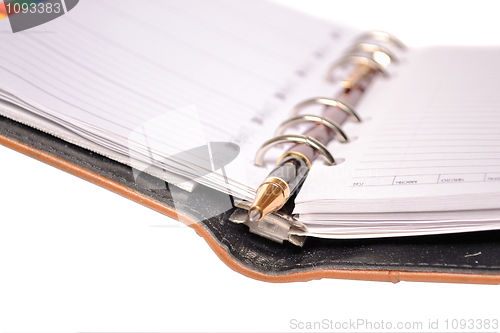Image of Planner and pen isolated on white background