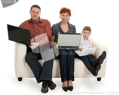Image of dad mom and son with laptop
