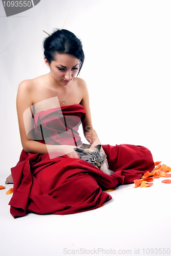 Image of pretty woman with cat     