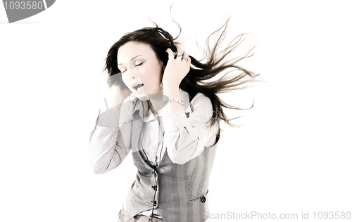 Image of Young girl in headphones   