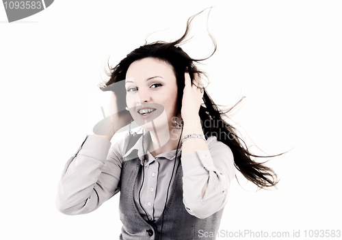 Image of Young girl in headphones   