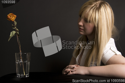 Image of girls and a rose