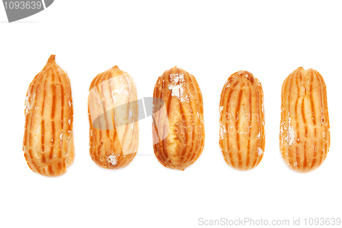 Image of Delicious eclairs arranged unlikely