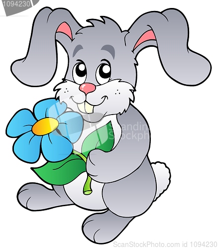 Image of Cute bunny holding flower