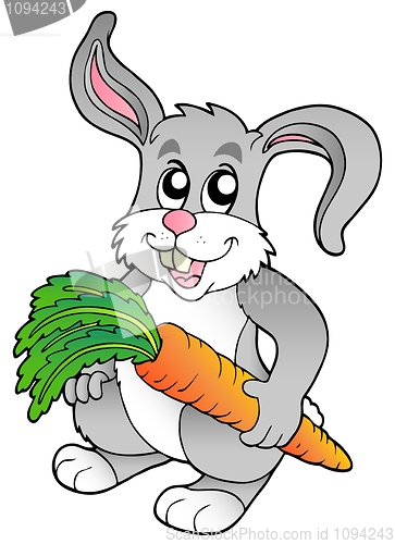 Image of Cute bunny holding carrot