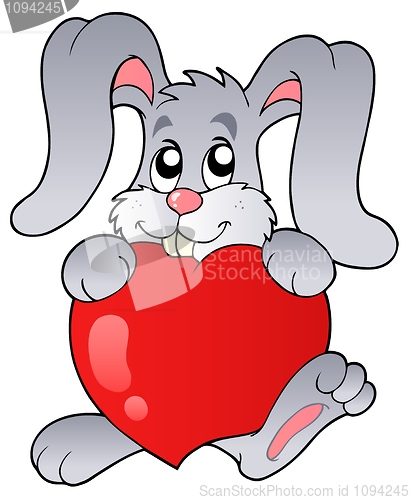 Image of Cute bunny holding heart