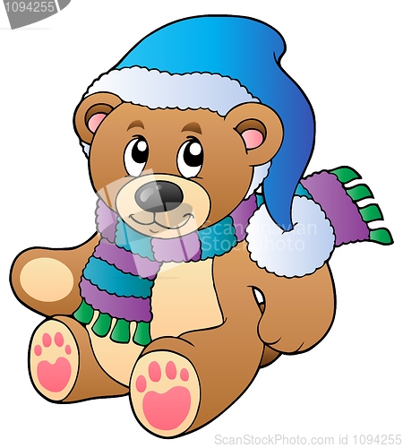 Image of Cute teddy bear in winter clothes