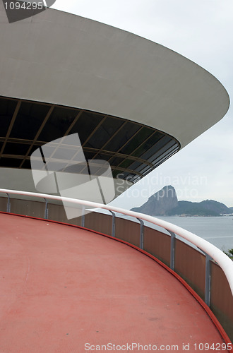 Image of Oscar Niemeyer's Niteroi Contemporary Art Museum and Sugar Loaf, in Rio de Janeiro, Brazil