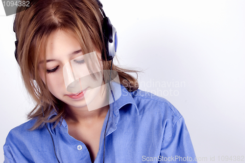 Image of Young girl in headphones   