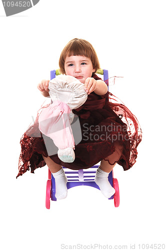 Image of Little girl with toy.