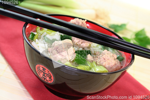 Image of rice soup with meat balls