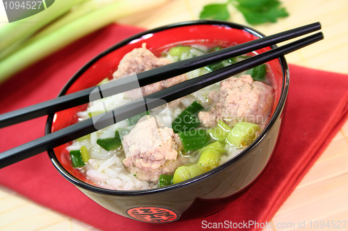 Image of rice soup with meat balls