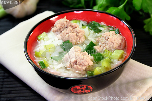 Image of rice soup with meat balls