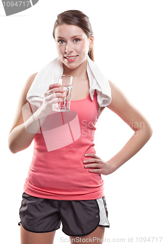 Image of Sporty woman holding water