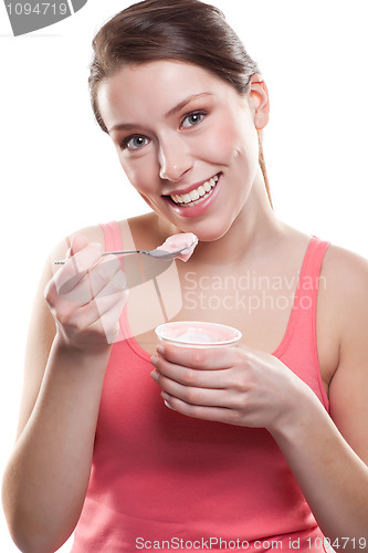 Image of Woman eating yogurt