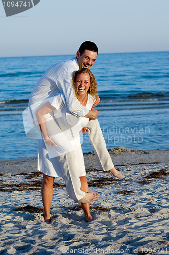 Image of Young couple having fun