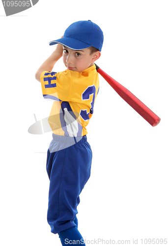 Image of Boy swinging a baseball bat