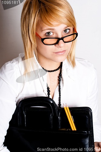 Image of businesswoman with portfolio 