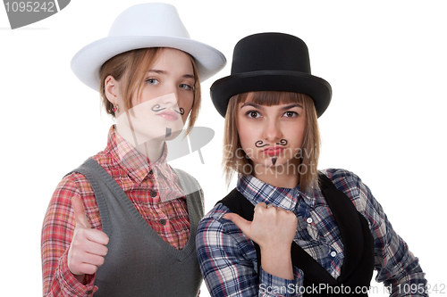 Image of Two girls with painted mustaches