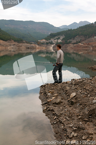 Image of man with a fishing