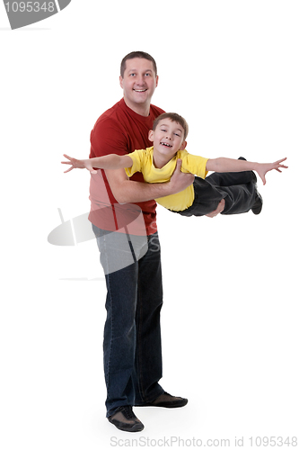 Image of Dad keeps his son in his arms