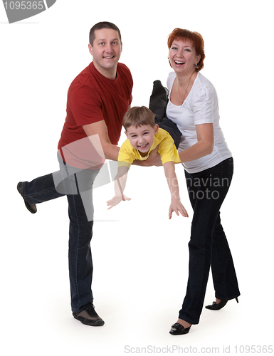 Image of Mom and Dad holding his son