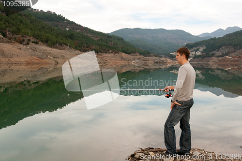 Image of man with a fishing