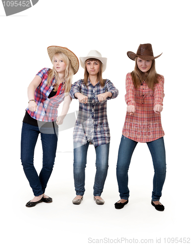 Image of Three girls in hats