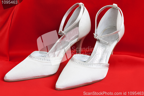 Image of Pair of white women's shoes