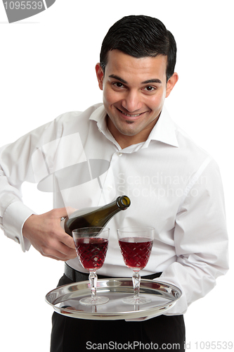 Image of Smiling servant or waiter with wine 