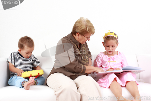 Image of Reading and playing with granny