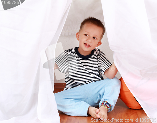 Image of Adorable boy playing