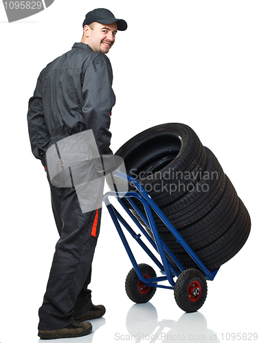 Image of manual worker with handtruck