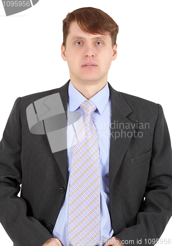 Image of Portrait of businessman in dark jacket on white background