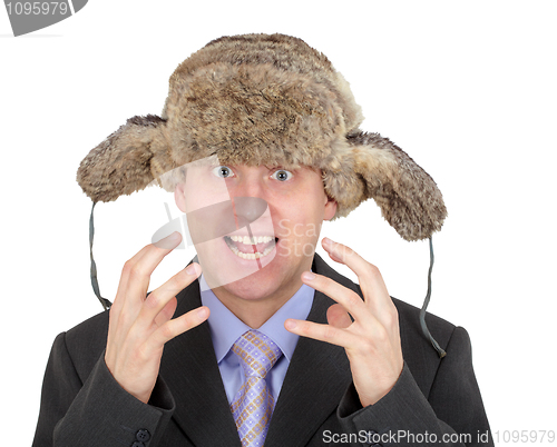 Image of Emotional man on white with a winter hat on head
