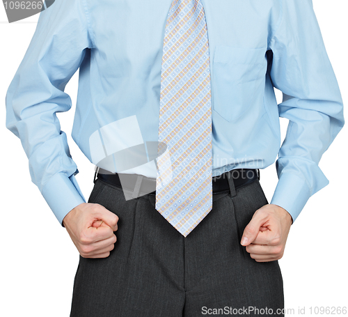 Image of Hands of businessman clenched in fists