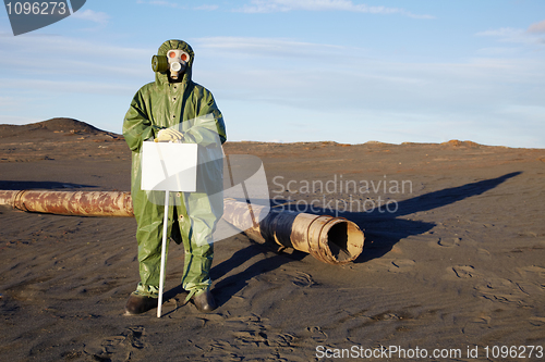 Image of Scientist with warning tablet in infection zone