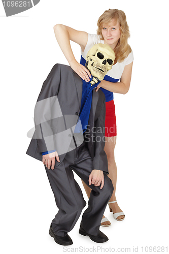 Image of Girl choking man in mask of death