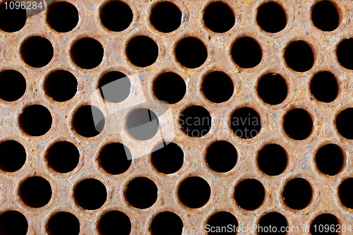 Image of Rusty iron grate - element of industrial heat exchanger